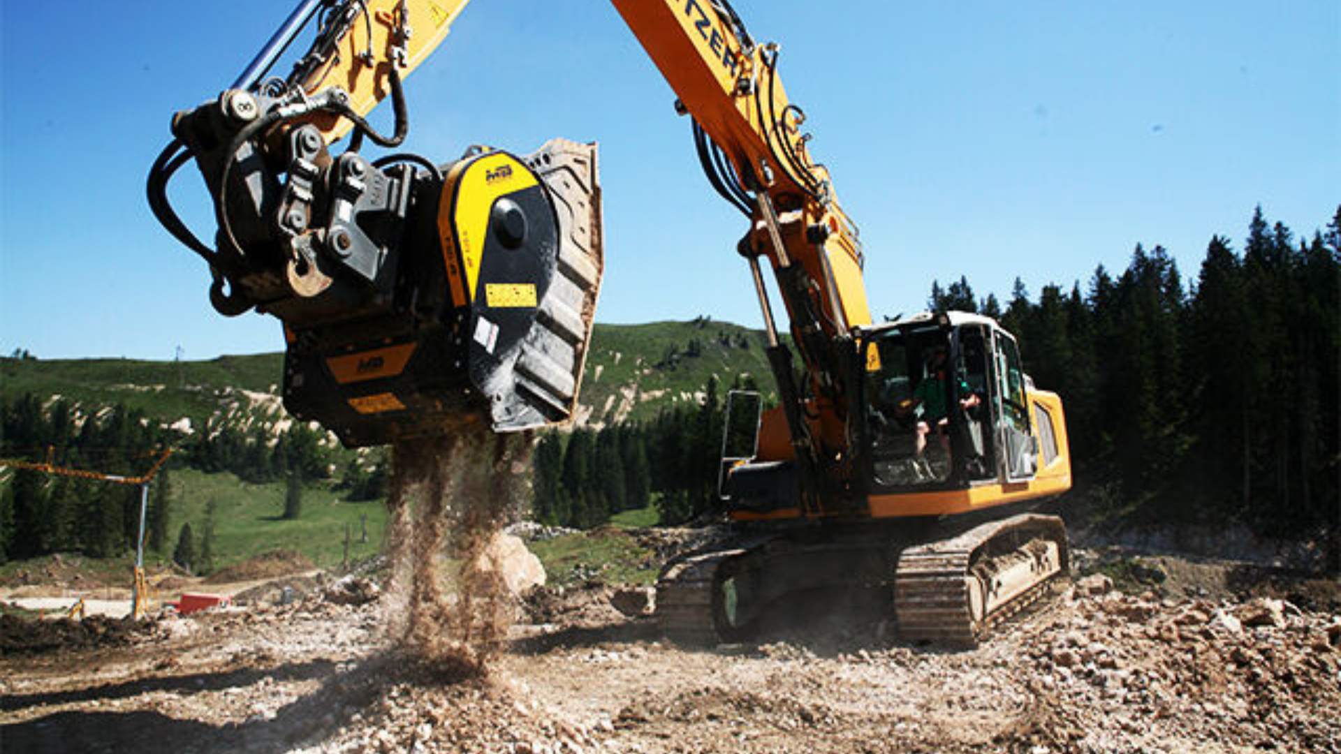 On-site material processing for mountain infrastructure using MB Crusher.